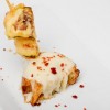 Crujiente de calabacín y cola de gambón sobre tosta de queso Ulloa e ibérico